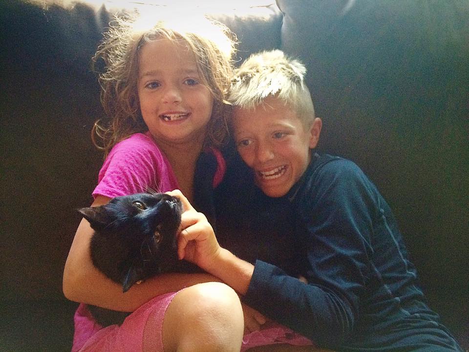 kids and cat that had to be trapped